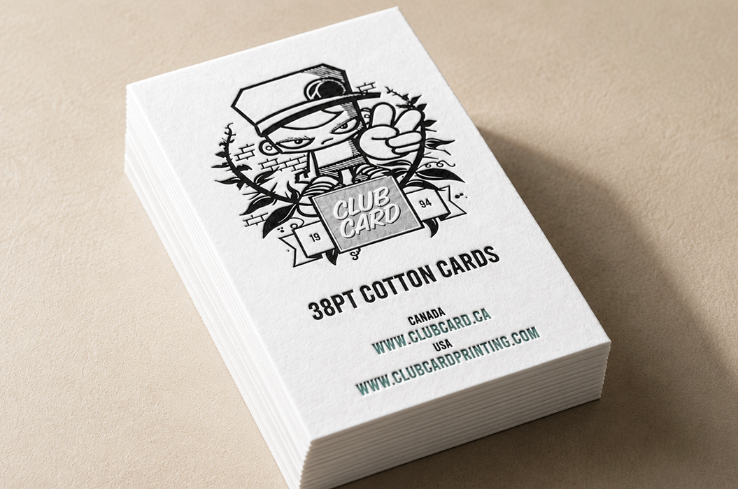 Stack of ultra thick 38pt white cotton letterpress business cards featuring a black line-art character illustration and Clubcard logo embossed words club card on an iridescent foil. 