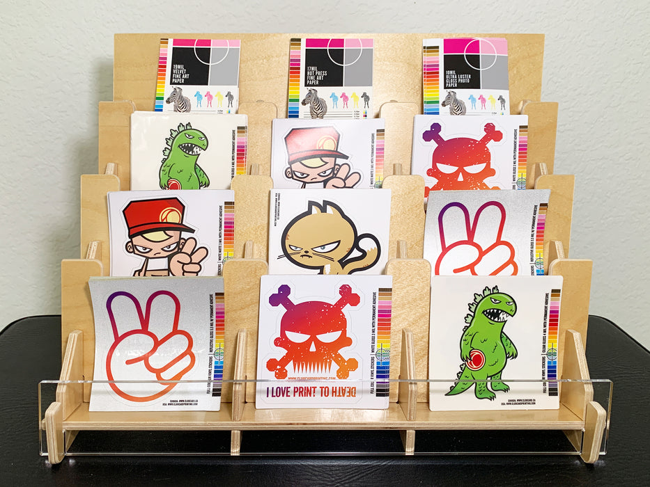 12 pocket sticker display rack made with light colour birchwood and a clear acrylic front with stickers in each pocket 