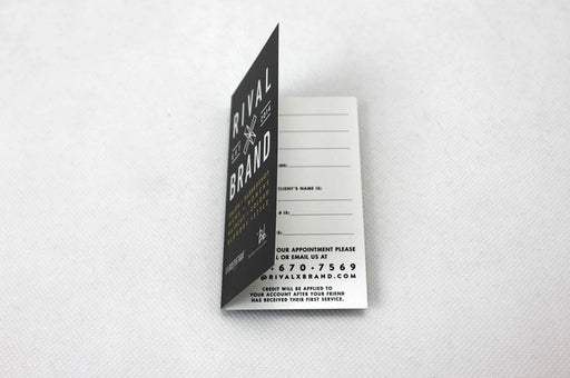 Custom folding business card printed in full color for Rival x Brand | Business card is designed vertically with the fold along the long side, and opens like a book | Printed on Silk Laminated 19pt Stock | Clubcard Printing USA