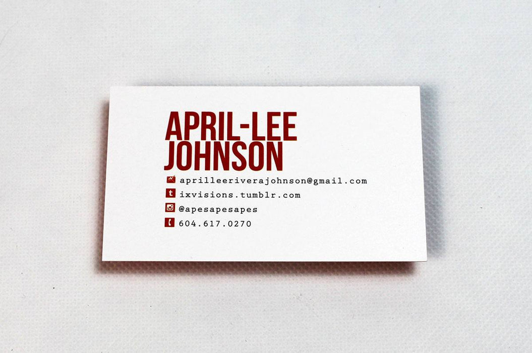 Custom business cards on 16pt coated card stock | name and social media icons in red | contact info text in black | Clubcard Printing USA