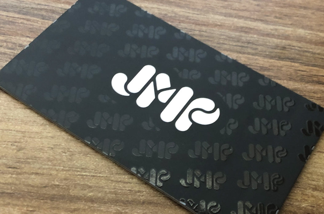 Custom business cards for JMP on Color Core Silk Business Cards 40pt | White JMP logo on a black background with the same logo as a pattern in spot gloss | Clubcard Printing USA