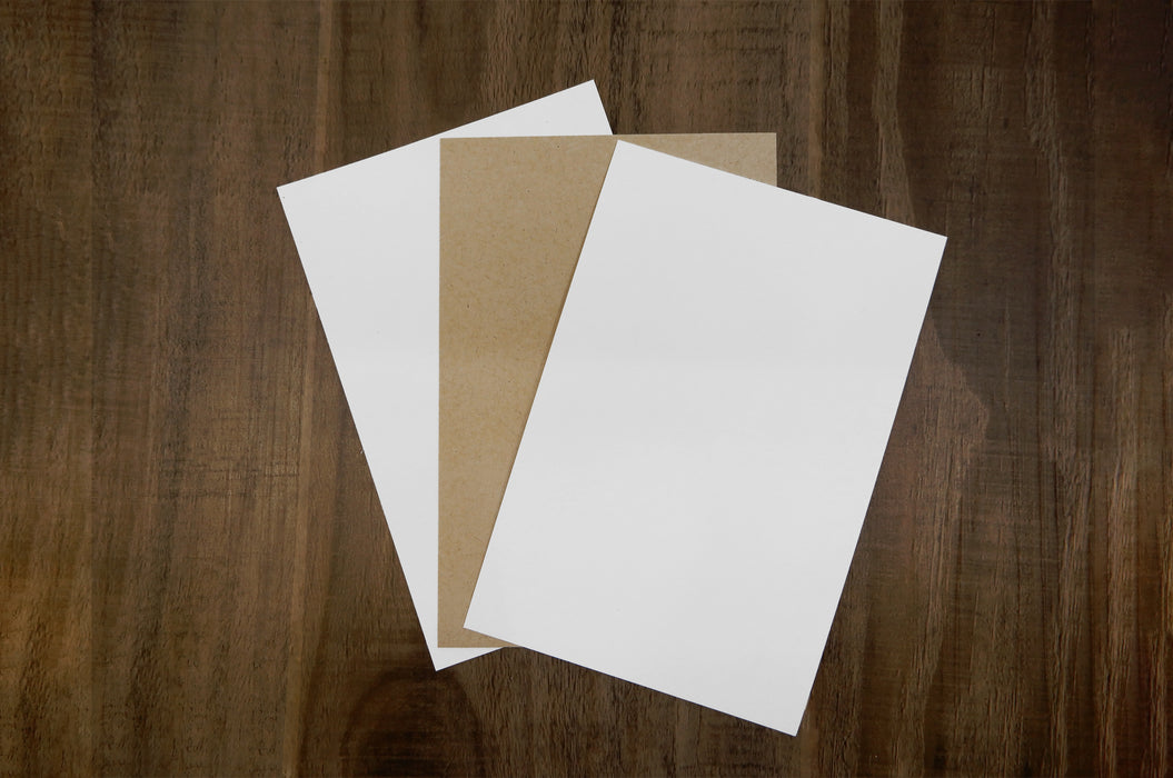 Coated and uncoated white with desert storm uncoated blank card stocks.
