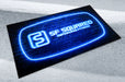 Custom printed business cards printed for SF Squared on out 20pt Soft Touch Laminated stock | Their logo designed as a blue neon sign on a brick wall | Clubcard Printing USA