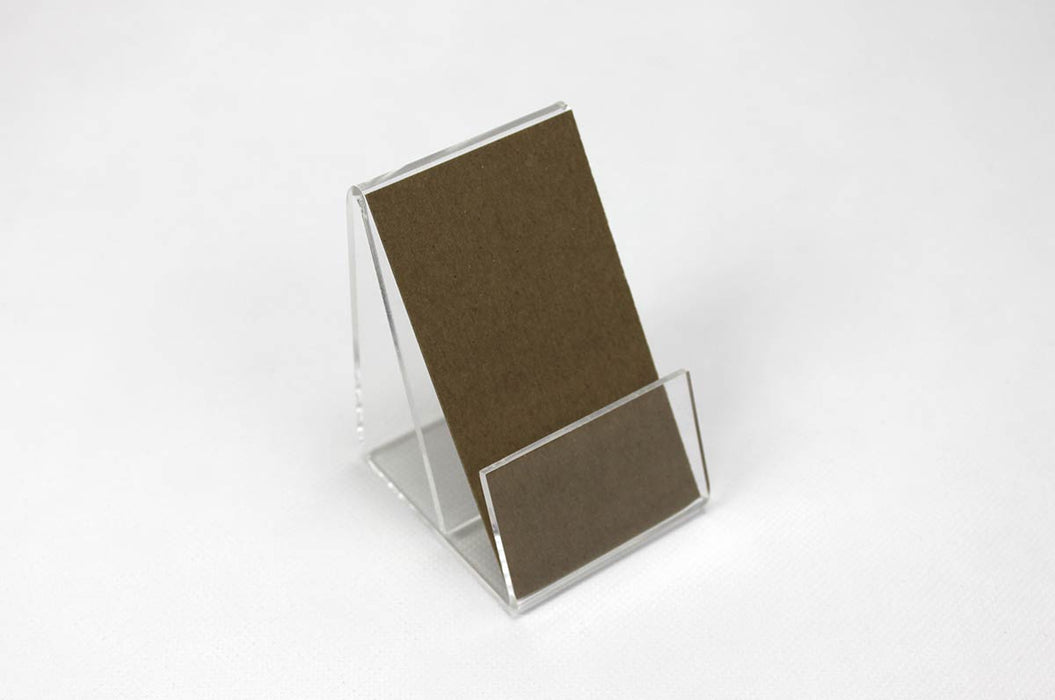 Vertical clear acrylic business stand frame holding a kraft card on a white background.