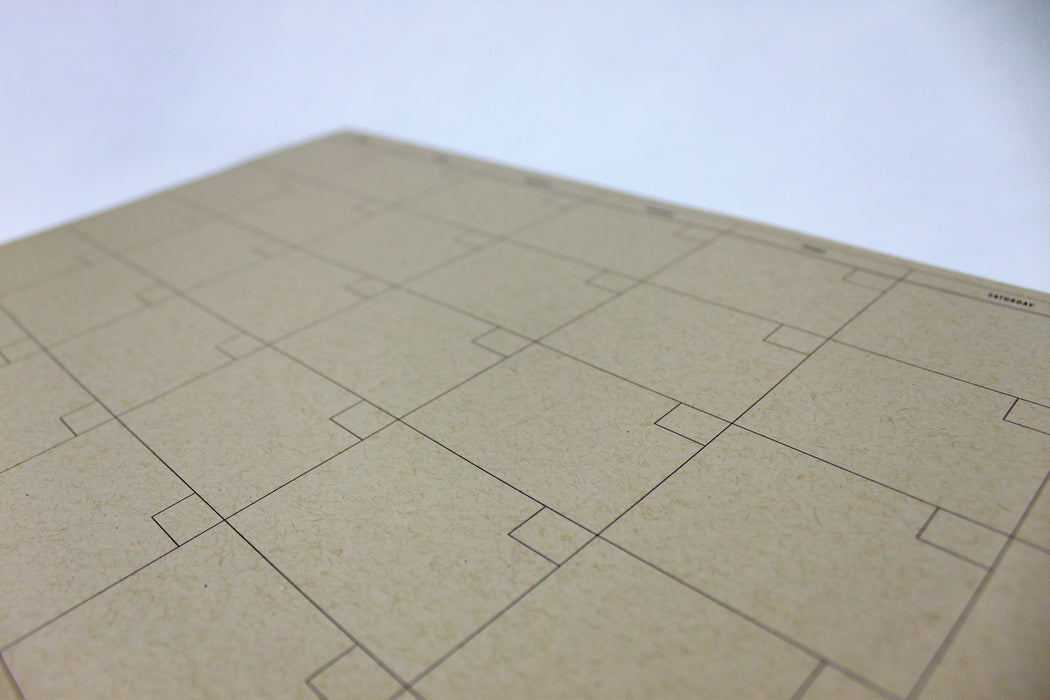 Natural kraft dateless monthly planner notepad.
