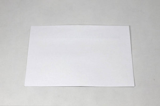 Back of an uncoated blank white wove envelope on a white background.